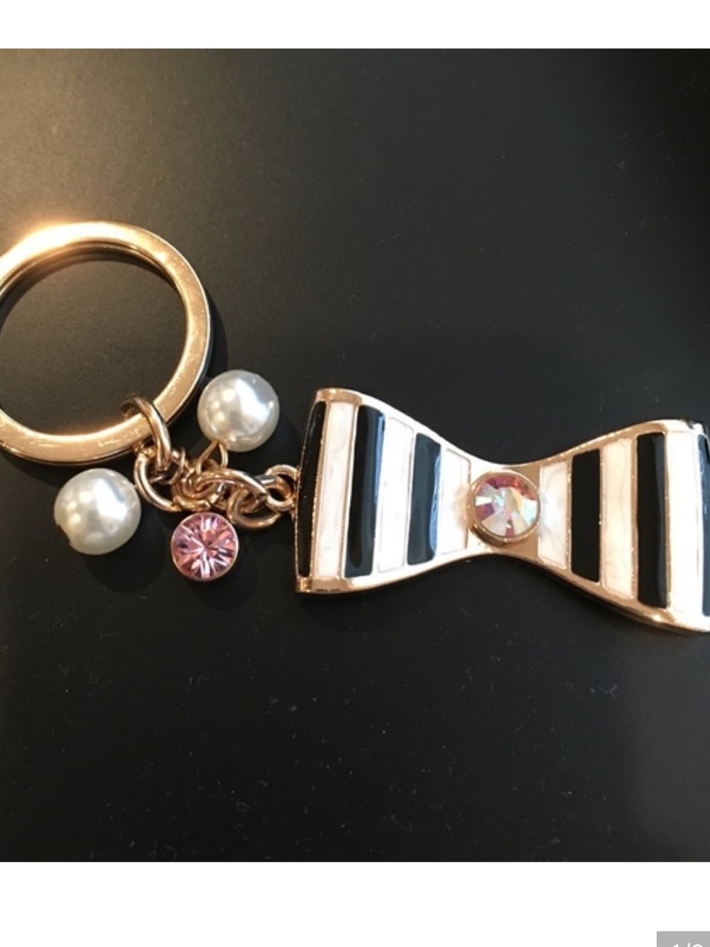 Gold Bow Keychain with Black & White Enamel and Pink Crystal Charm